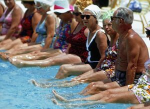 retired people at a pool party