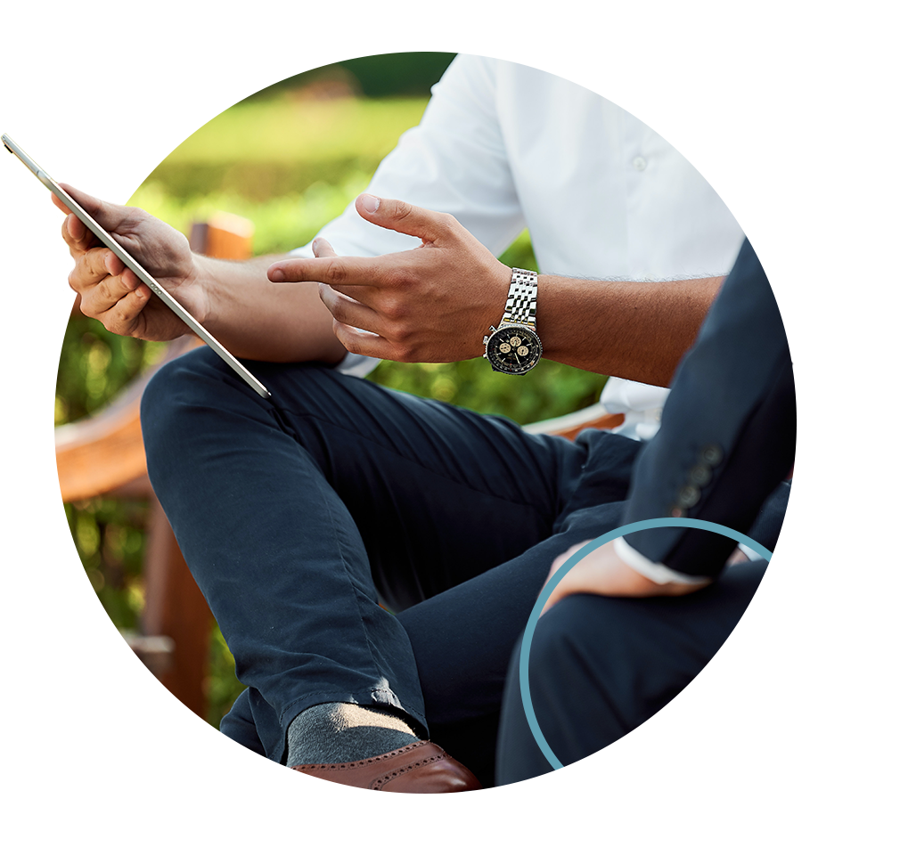 A financial advisor showing a client his finances
