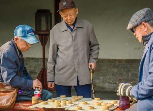 elderly men playing a game together